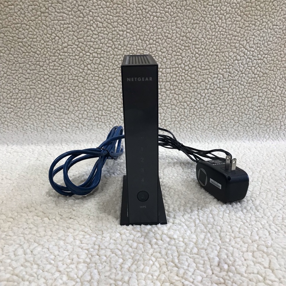 NETGEAR N300 Wireless N Router
WNR2000
blue internet cable & AC-DC Adapter cord - Picture 12 of 16